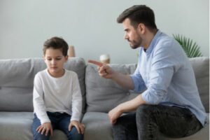 ​​child discipline during custody proceedings, father scolds son